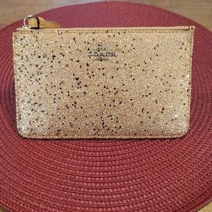 Coach gold glitter wristlet